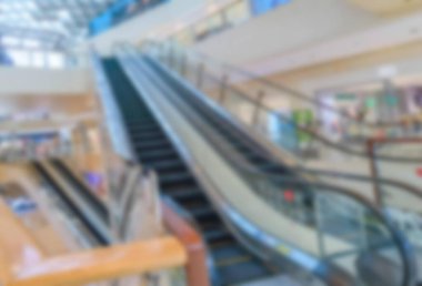 Çin 'deki Hangzhou' da bir alışveriş merkezinde çekilen yürüyen merdivenlerin soyut görüntüsü bulanık..