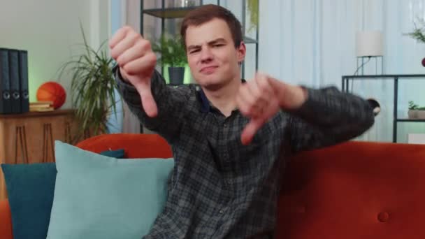 Dislike Upset Teen Man Showing Thumbs Sign Gesture Expressing Discontent — Stock Video
