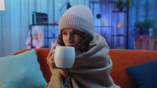 Sick Woman Wrapped Plaid Sit Alone Shivering Cold Sofa Drinking — Vídeos de Stock