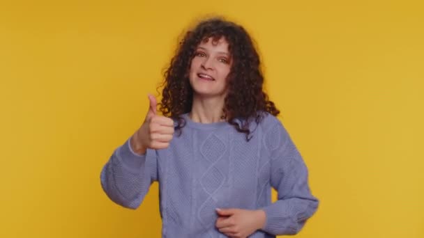Pretty Curly Haired Woman Sweater Raises Thumbs Agrees Something Gives — Video Stock