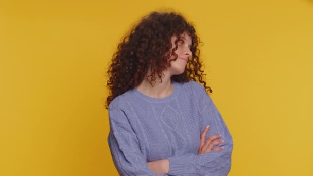 Cheerful Funny Bully Curly Haired Woman Showing Tongue Making Faces — Stock Video