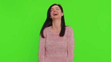 Amused pretty woman pointing finger to camera, laughing out loud, taunting making fun of ridiculous appearance, funny joke anecdote, bullying. Young adult girl isolated alone on chroma key background