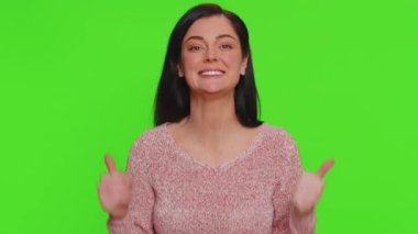 Lovely cheerful young woman greatly approves your suggestion, shaking head approvely, satisfied with good quality work, like proposal, Yes. Pretty one pretty girl isolated on chroma key background