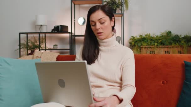 Young Woman Sitting Couch Closing Laptop Finishing Work Living Room — Video