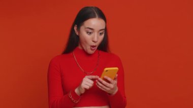 Happy excited joyful woman use smartphone typing browsing shouting say wow yes found out great big win, good news, lottery jackpot goal achievemen, game victory, celebrating success, winning, like