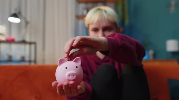 Poor Woman Short Blonde Hair Insufficient Amount Money Holding Piggybank — Video Stock