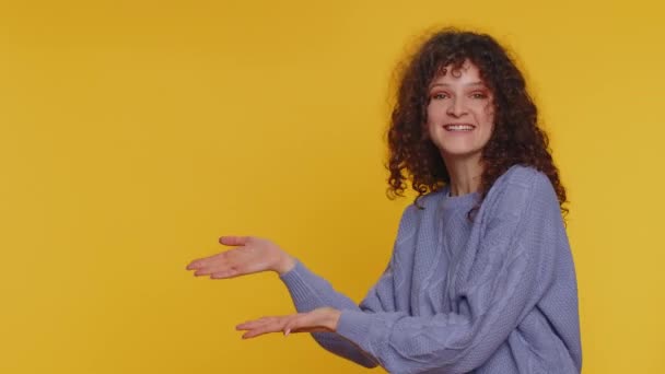 Lovely Happy Curly Haired Woman Showing Thumbs Pointing Empty Place — Video