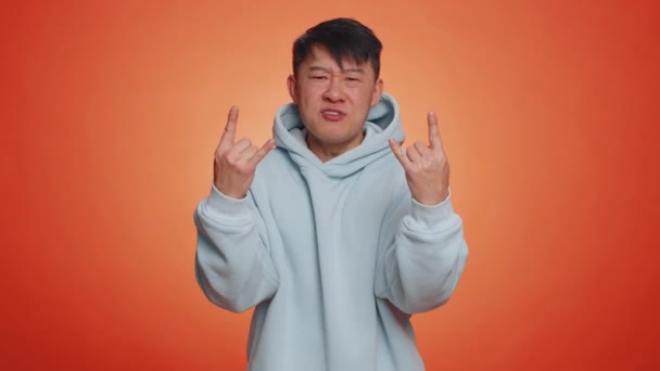 Overjoyed Delighted Asian Handsome Man Showing Rock Roll Gesture Hands — Stock video