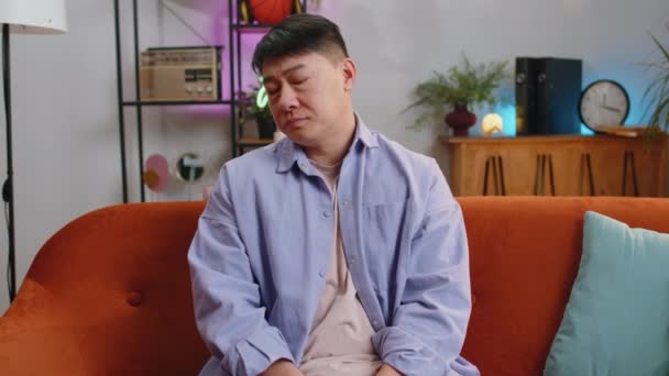 Sad Lonely Man Sitting Home Room Looks Pensive Thinks Life — Vídeos de Stock