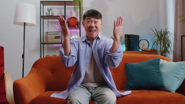 Money Cash Dollar Rain Falling Asian Man Celebrating Success Winning — Stok video