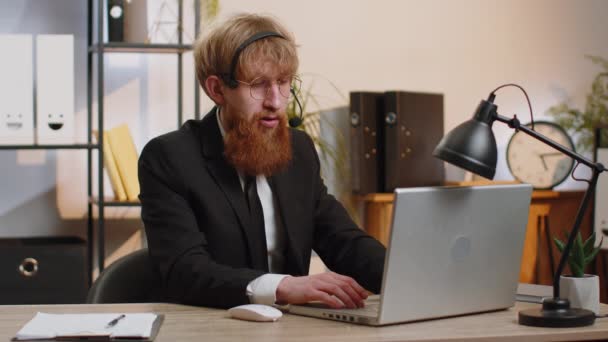 Young Business Man Working Laptop Wearing Headset Freelance Worker Call — Stock videók