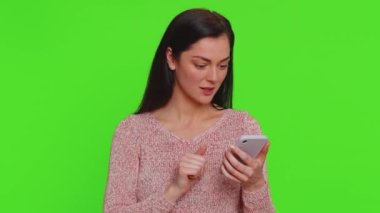 Happy excited joyful woman use smartphone typing browsing shouting say wow yes found out great big win, good news, lottery jackpot goal achievemen, game victory, celebrating success, winning, like