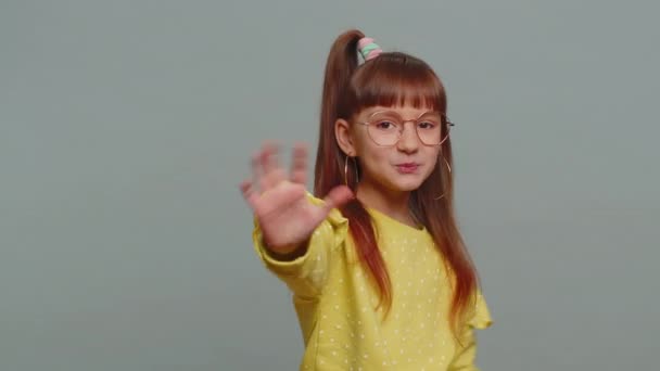 Young Toddler School Girl Glasses Smiling Friendly Camera Waving Hands — Stockvideo