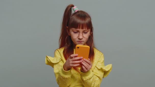 Young Toddler School Girl Glasses Use Smartphone Typing Browsing Loses — Stok video