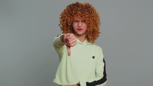 Dislike Upset Young Child Girl Kid Curly Hair Showing Thumbs — Stock Video