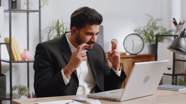 Indian Businessman Fingers Crossed Working Laptop Home Office Desk Typing — Stock videók