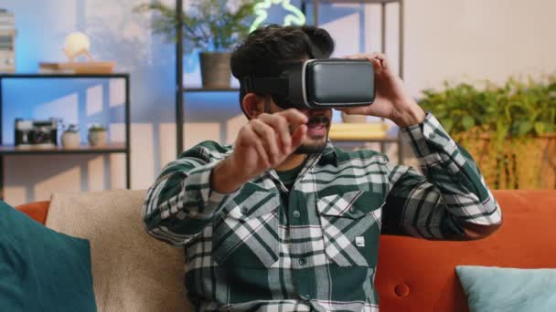 Indian Man Using Virtual Reality Futuristic Technology App Headset Helmet — Stockvideo