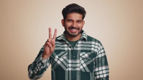 Young Indian Man Showing Victory Sign Hoping Success Win Doing — Vídeos de Stock