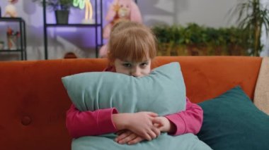Sad child kid girl worried about a failed exam at school or unrequited love, suffers from unfair situation. Problem, violence in family, depressed, bullying abuse, quarrel. Female teen toddler at home