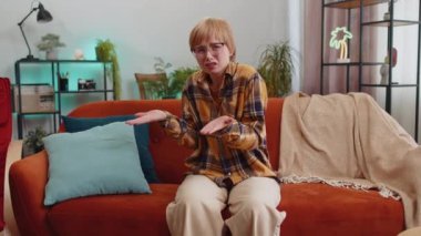 Woman raising hands asking what why reason of failure, demonstrating disbelief irritation by troubles trendy social media meme anti lifehacks ridicules people who complicate simple tasks for no reason
