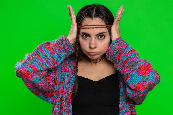 Dont want to hear and listen. Frustrated annoyed irritated woman covering ears gesturing No, avoiding advice ignoring unpleasant noise loud voices. Hippie girl isolated alone on chroma key background