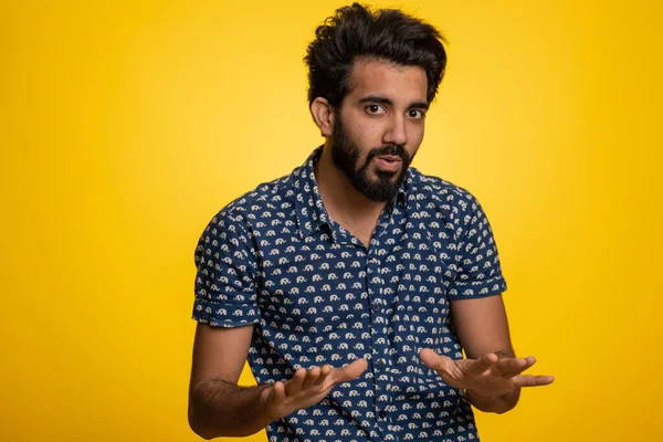 Stock image Hey you, be careful. Indian man warning with admonishing finger gesture, saying no, be careful, scolding and giving advice to avoid danger, disapproval sign. Hindu guy isolated on yellow background