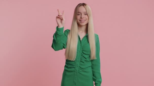 Young Caucasian Woman Showing Victory Sign Hoping Success Win Doing — Stock Video