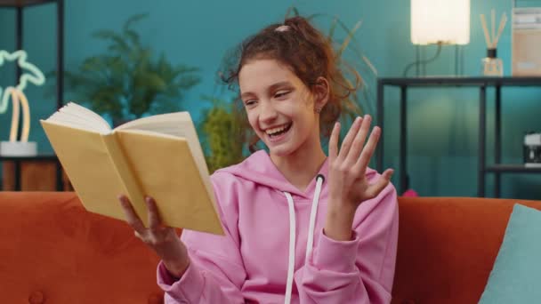 Caucasian Preteen School Girl Reading Funny Interesting Fairytale Story Book — Stock Video