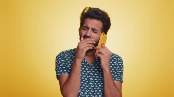 Disinterested Young Indian Man Having Annoyed Boring Talk Smartphone Tired — Stock Video