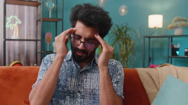 Displeased Indian Man Rubbing Temples Cure Headache Problem Suffering Tension — Vídeo de stock