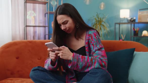 Sad Displeased Woman Use Smartphone Typing Browsing Loses Becoming Surprised — Stock Video