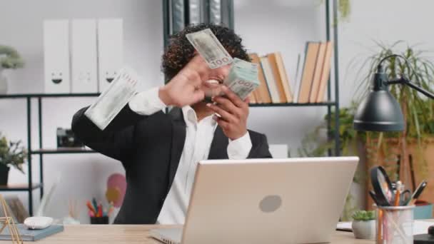 Cheerful Rich Young Indian Businessman Working Laptop Wasting Throwing Money — Stock Video