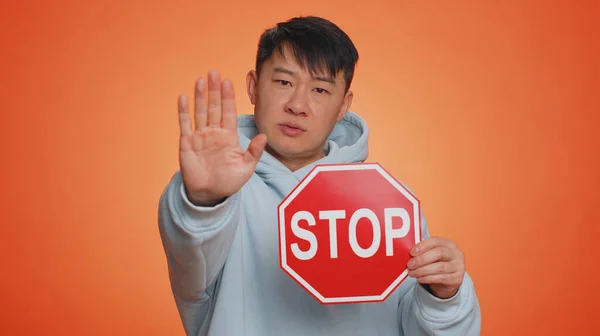 Serious Asian Man Say Hold Inscription Text Red Stop Danger — Stockfoto