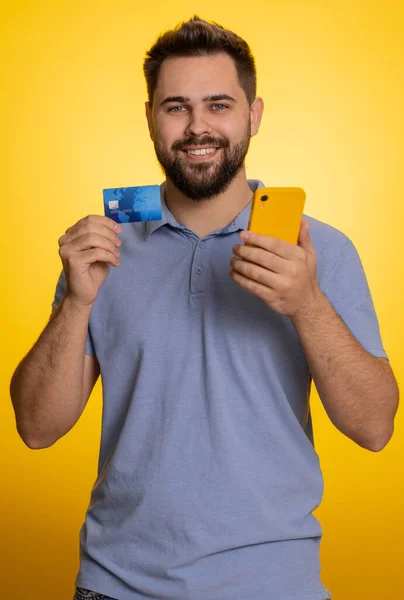 Sincere Man Customer Using Credit Bank Card Smartphone While Transferring — Stock Photo, Image