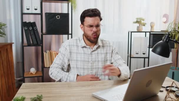 Disappointed Hispanic Male Freelancer Feeling Overeating Work Process Laptop Home — Stock Video
