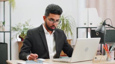 Conflict Quarrel Negotiation. Angry businessman CEO making webcam laptop online video call at office. Upset mad freelancer man talking colleague conversation analyzing financial report mistake problem