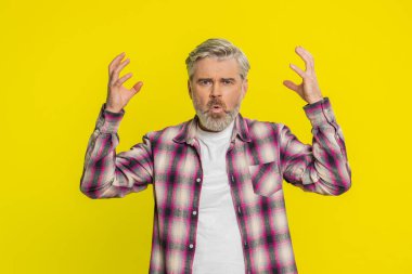 Caucasian middle-aged mature man on yellow background experiencing mind explosion, bright aha moment. Intellectual breakthrough unexpected solution strong brainstorming reaction excited face gesture clipart