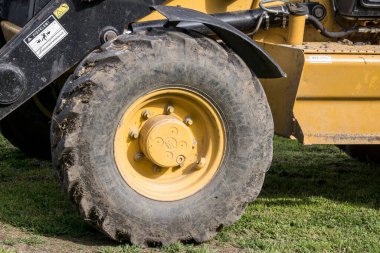 Kullanılmadığında Yakalama Makinesinin araçları dinleniyor.