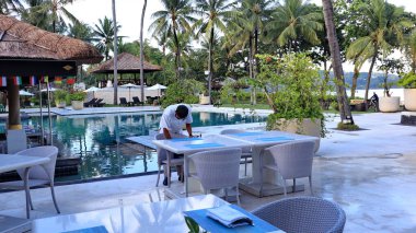 Hotel workers when cleaning restaurant facilities so that guests are comfortable,Bali island, December 9 2022
