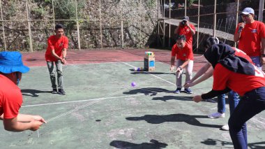 group of people are playing team working Game to build a teamwork, Semarang Indonesia, December 17, 2022