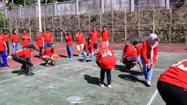 group of people are playing team working Game to build a teamwork, Semarang Indonesia, December 17, 2022