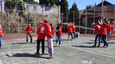 group of people are playing team working Game to build a teamwork, Semarang Indonesia, December 17, 2022