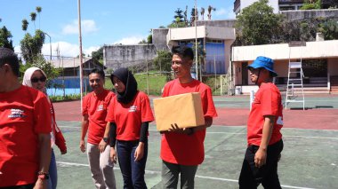 group of people are playing team working Game to build a teamwork, Semarang Indonesia, December 17, 2022