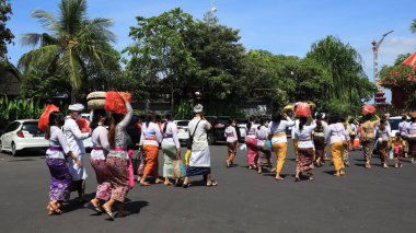Balinese Hindus prepare for their routine worship Denpasar Indonesia December 8 2022