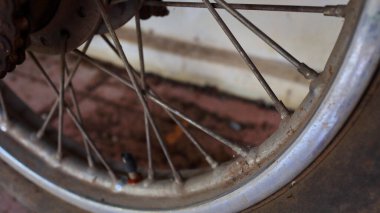 motorcycle tires that are worn and rusty but are still usable