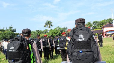 13 Şubat 2024 'te Pekalongan Endonezya' daki genel seçimin güvenliğini sağlamak için çeşitli unsurlardan askerlerin seremonisi