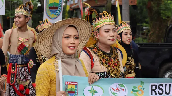 stock image Community cultural parade with various unique and traditional costumes, Batang Indonesia, April 25 2024