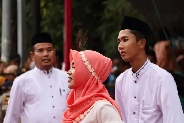 stock image Beautiful women dancing together on the street in a parade, Pekalongan Pekalongan April 1 2019