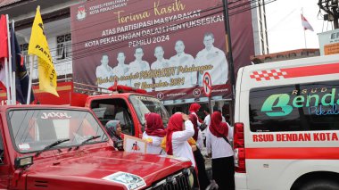 Kampanya sırasındaki topluluk, 23 Eylül 2024 tarihinde belediye başkanı adayı Pekalongan Endonezya 'yı desteklemektedir.