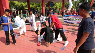 Genç sporcuların dövüş sanatları gösterisi, Pekalongan Endonezya 16 Ekim 2024